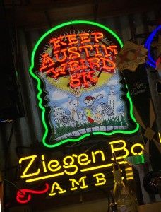 Keep Austin Weird neon sign in a bar.