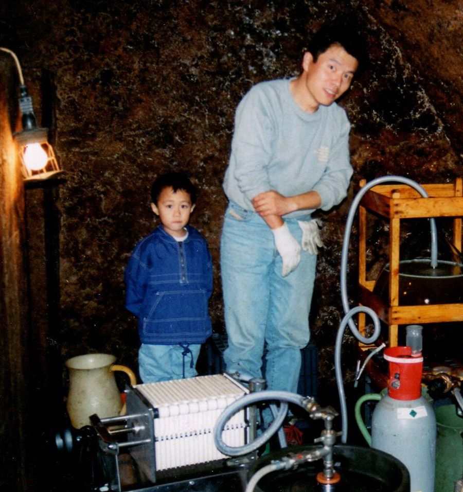 Hiro and his young son Ken making their own Germany Riesling in 1998.