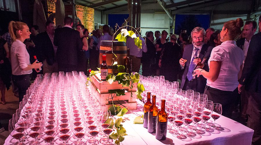 Stephen Henschke has a look at the Henschke and Saltram  wines at their table during  the 125th Celebrations : Photo © John Krüger