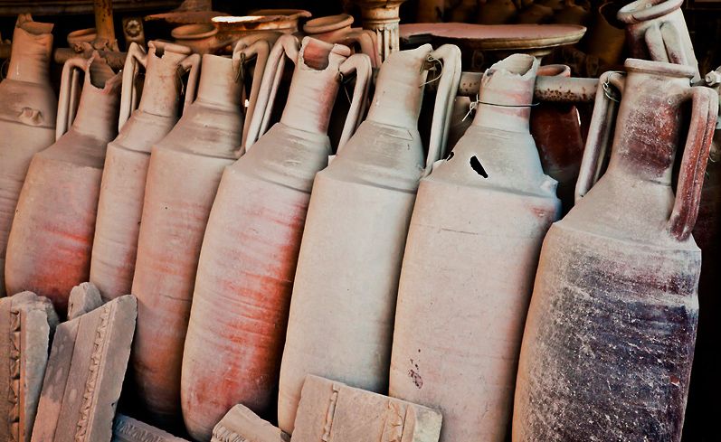 A Row Of Amphora Wine Vessels From The Ruins Of Pompeii : Photo vinepair.com
