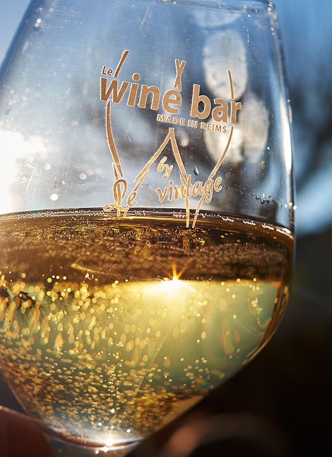 Bubbles in a glass. Le Wine Bar: Place De Forum, Reims  : Photo © Milton Wordley