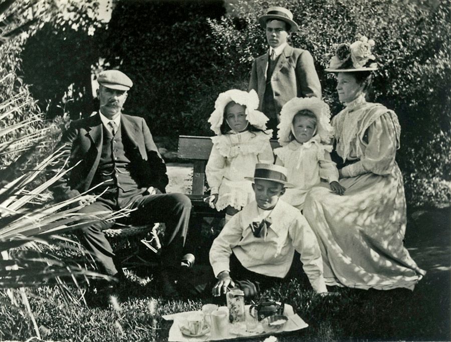 Roly Birks as a young boy with his family. Roly is on the grass at the front.