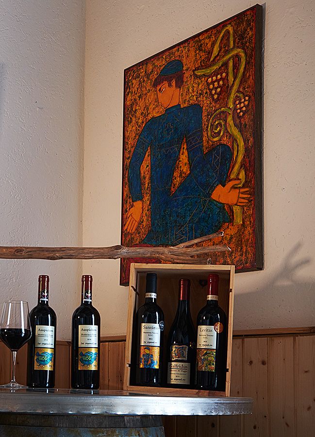 One of Georgian artist, Levan Mosiashvili's paintings on the wall at the winery : Photo © Milton Wordley.
