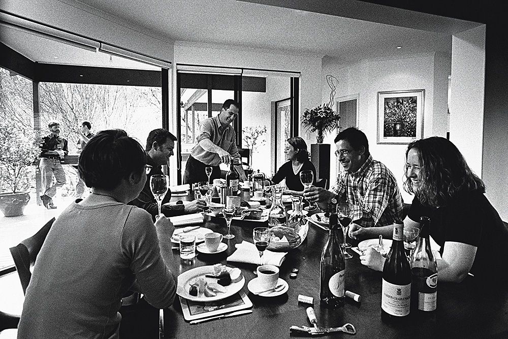 Con Moshos at home with some of the Petaluma staff in a photograph from the 1999 Petaluma AGR : Photo © Milton Wordley.