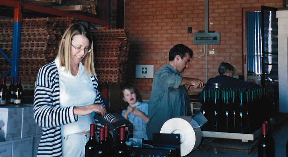 Bryan, Jocelyn and their daughter Lily bottling the first Ravensworth wine back in 2001.